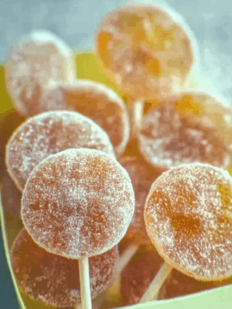 homemade dandelion lollipops coated with sugar